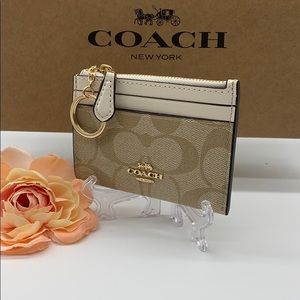 Mini Skinny Id Case In Signature Canvas